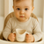 BABYONO Hrnček ergonomický s uškami 120 ml beige 6m+