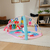 BABY EINSTEIN Igračka deka s aktivnostima 4u1 Kickin’ Tunes™ Jellyfish Jamboree™ 0m+