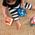 BABY EINSTEIN Textil játék kockák ábécé Alpha Stacks™ 4db, 3hó+