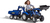 Falk Šliapací traktor 3090W New Holland T8 s nakladačom, rypadlom a maxi vlečkou