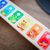 BABY EINSTEIN Hračka drevená hudobná gitara Together in Tune Guitar™ Connected Magic Touch
