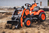 Falk šliapací traktor 2065N Kubota backhoe s predným bagrom a prívesom s otočným bagrom
