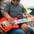 BABY EINSTEIN Hračka drevená hudobná gitara Together in Tune Guitar™ Connected Magic Touch