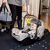 BABY EINSTEIN Hračka s hrkálkou naťahovacia na C krúžku Cal-a-Puller™ 0m+