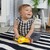 BABY EINSTEIN Jucărie activă cu ventuză Pop &amp; Glow Starfish™ 6m+