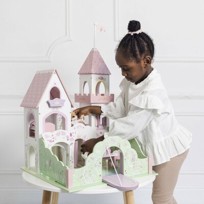 TV641-fairybelle-castle-girl-playing-with-doll.jpg