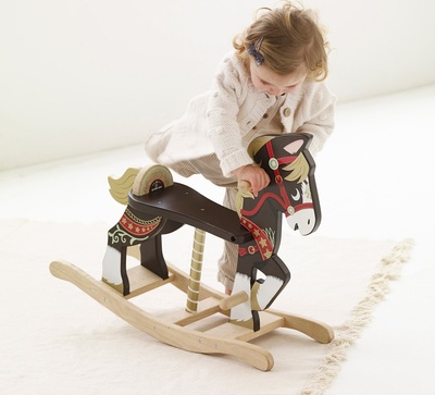 PL140-carnival-rocking-horse-child-getting-on-ride-on.jpg