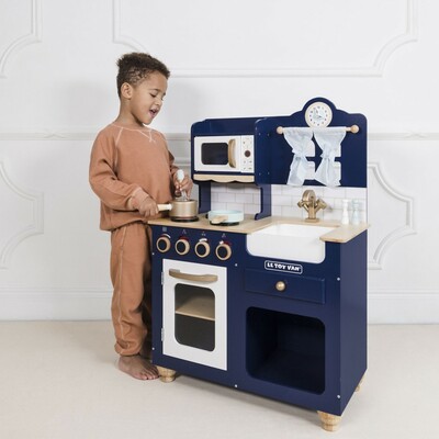 TV325-oxford-kitchen-child-whisking.jpg