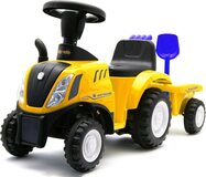 Detské odrážadlo traktor s vlečkou a náradim Baby Mix New Holland žltý