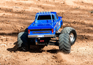 36034-61-Bigfoot-action-rear-Dirt-9500-RGB-web.jpg