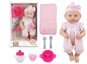Bébé avec accessoires 28cm corps rigide dans une boîte 22x36x10cm