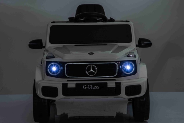 Auto elettrico Mercedes G580 12V, bianco, telecomando 2,4 GHz, Bluetooth, USB /