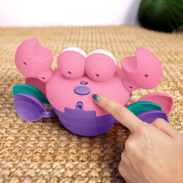 BRIGHT STARTS Jucărie muzicală și multisenzorială Rockin' Crawling Crab™ - Roz, 6m+