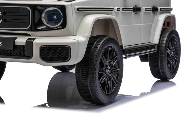 Auto elettrico Mercedes G580 12V, bianco, telecomando 2,4 GHz, Bluetooth, USB /