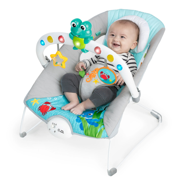 BABY EINSTEIN Lehátko hudobné vibračné so svetielkami Kick to It Neptune do 9 kg