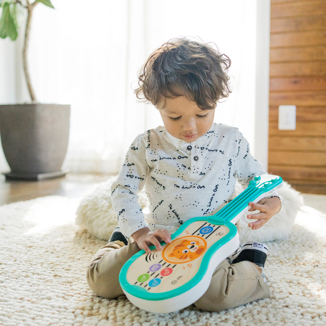 Baby Einstein Spielzeug Musikalische Holz-Ukulele Magic Touch HAPE 6m+