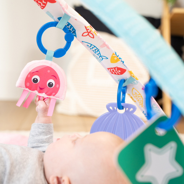 BABY EINSTEIN Igračka deka s aktivnostima 4u1 Kickin’ Tunes™ Jellyfish Jamboree™ 0m+