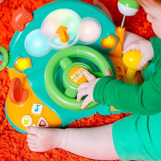 BRIGHT STARTS Hudobný svetelný volant Lights &amp; Colors Driver™ 6m+