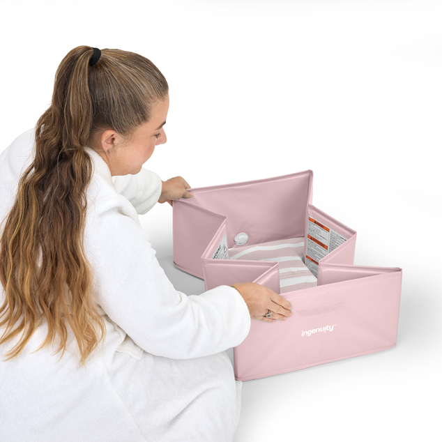 INGENUITY Sklopiva putna kadica Tuckaway ružičasta 12m+