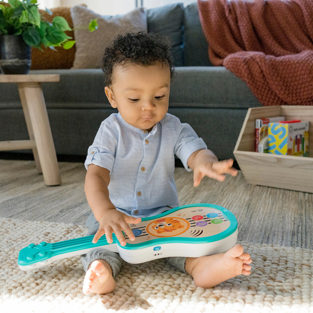 Baby Einstein Spielzeug Musikalische Holz-Ukulele Magic Touch HAPE 6m+