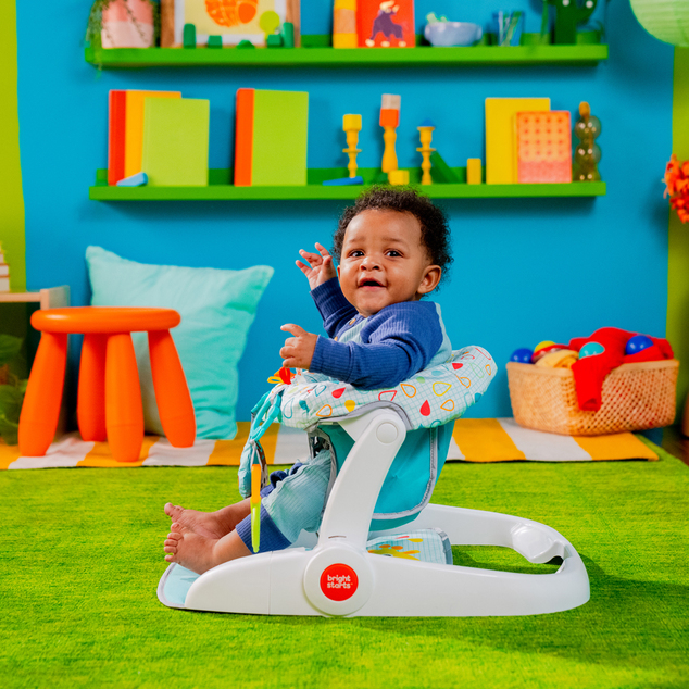 BRIGHT STARTS Siège d'apprentissage avec jouets prêt pour le voyage Learn-to-Sit™, 4m+