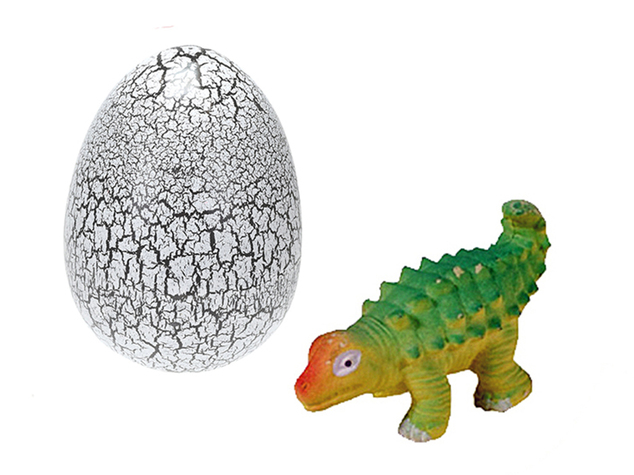 Dinoworld dinosaure éclosant et grandissant dans une boîte