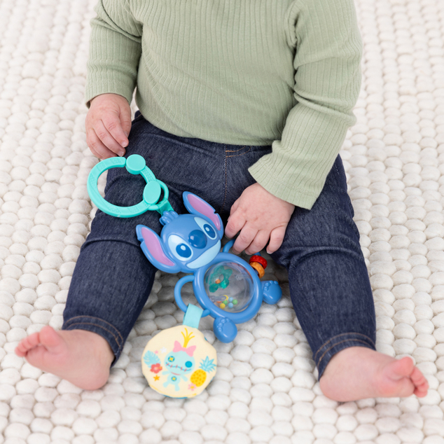 Bright Starts Jucărie pe inel C senzorială Stitch Tummy Tumble™