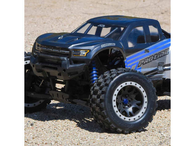 Pro-Line koleso 4.3", pneu Badlands MX43 Pro-Loc, disk Impulse H24mm čierno-sivý (2) (X-Maxx)