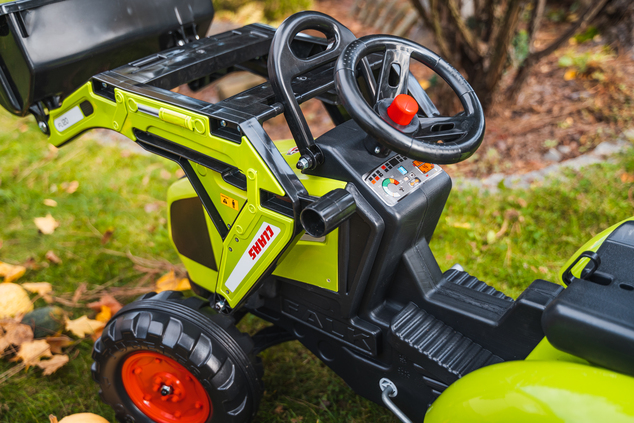 Falk Šliapací traktor 1010W Claas Axos s nakladačom, rýpadlom a vlečkou