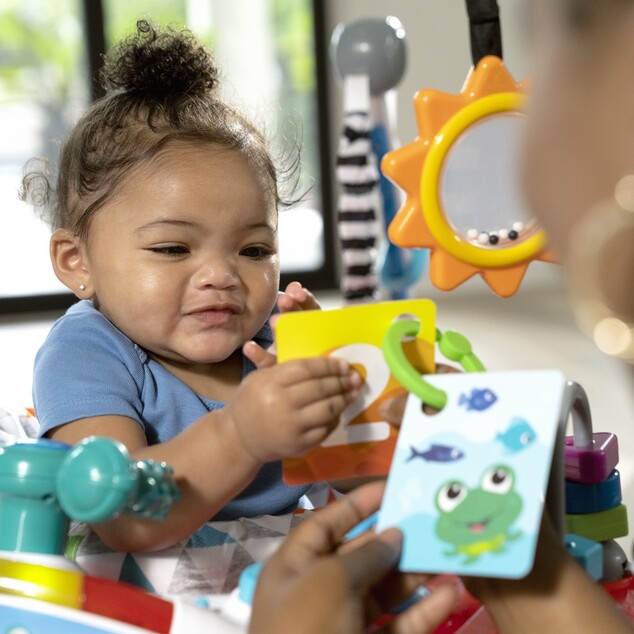 BABY EINSTEIN Skákadlo/aktívne centrum 2v1 Ocean Explorers Airplane Adventure™