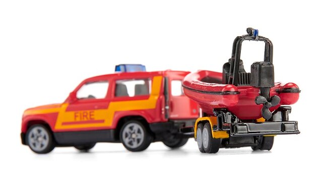 SIKU Blister - Land Rover s čamcem