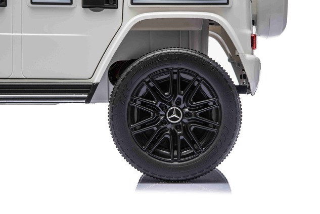 Auto elettrico Mercedes G580 12V, bianco, telecomando 2,4 GHz, Bluetooth, USB /