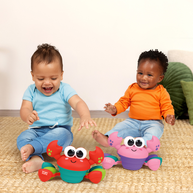 BRIGHT STARTS Jucărie muzicală și multisenzorială Rockin' Crawling Crab™ - Roz, 6m+