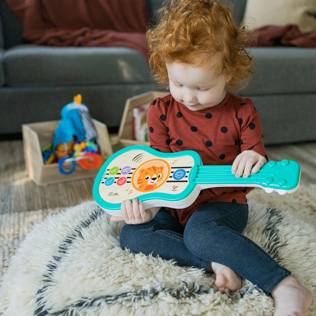 Baby Einstein Spielzeug Musikalische Holz-Ukulele Magic Touch HAPE 6m+